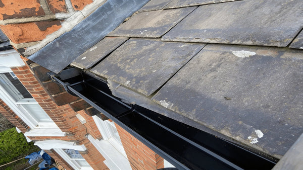 After — Gutter cleared and flowing freely